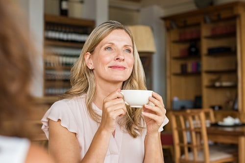 Happy and satisfied woman enjoying