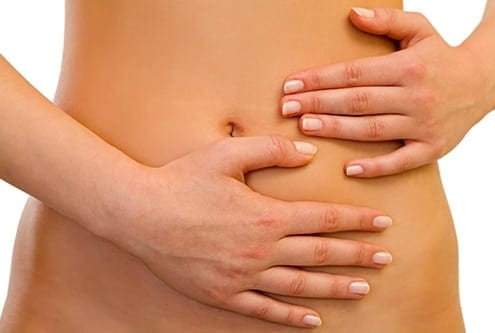 Close up of a woman stomach pain