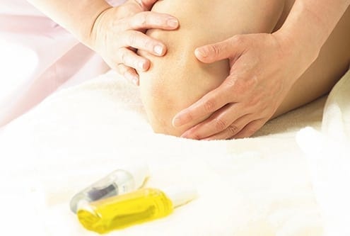 Womans Knee With Essential Oil