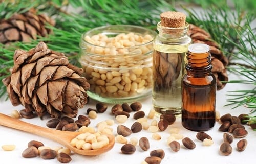 Dropper bottles with aromatic pine nut oil with cedar